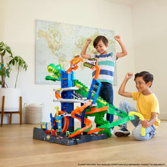 Hot Wheels City Ultimate T-Rex Garage With 2 Toy Cars & Storage For 50+, Race & Stunt, Dino Nemesis