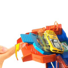 Hot Wheels City Vehiculo de juguete Pistas sorpresa Downtown